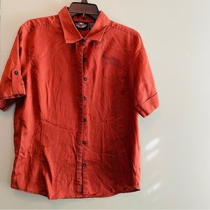 Women’s Harley Davidson button up shirt brown that shirt is not orange